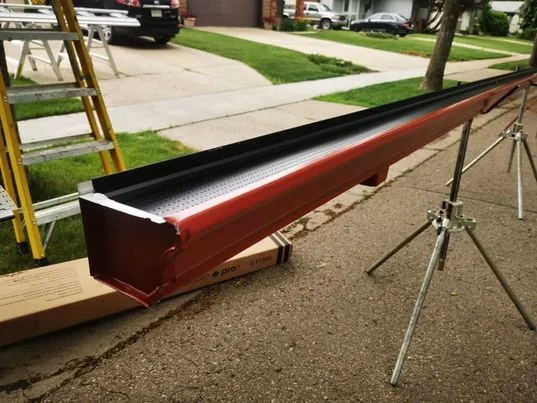 Seamless eavestrough formed on site before installation