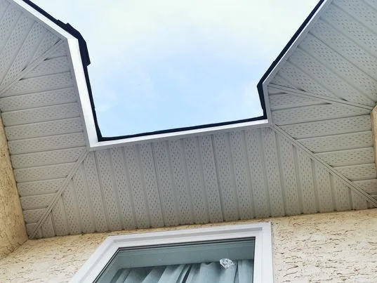 Soffit trimmed around an angled overhang
