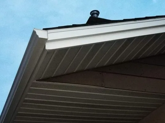 White vented soffit and fascia fastened with screws
